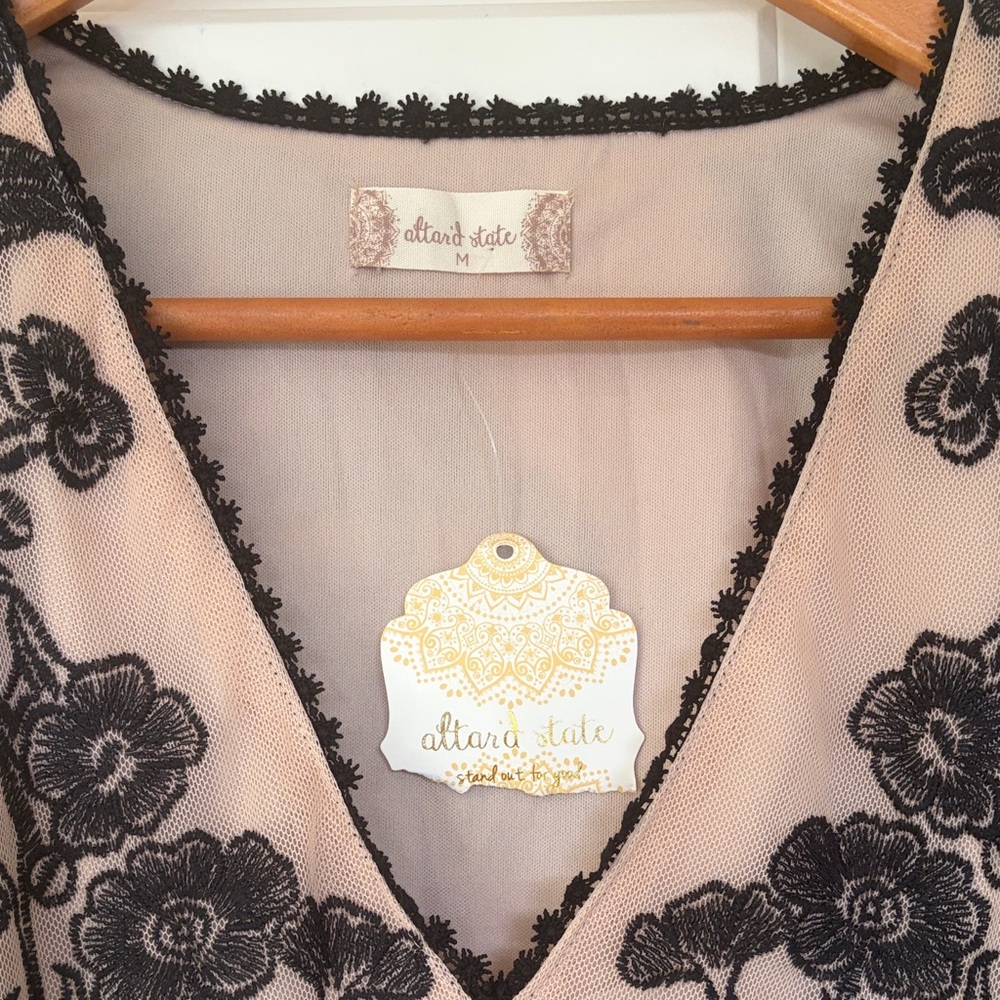 Altar'd State Black Floral Embroidered Sheer V-Neck Crop Top on Nude - Picture 6 of 7